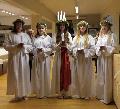 Lucia Jessica Grönroos med tärnor och Trubaduren Claus Terlinden